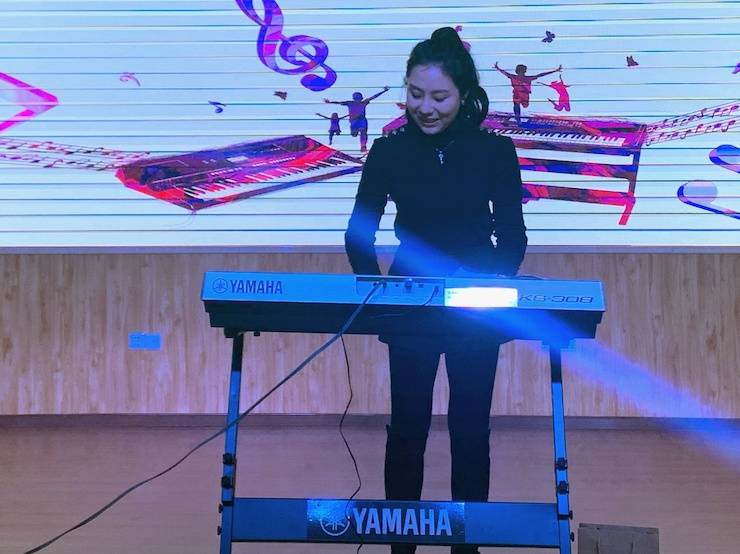 让音乐陪伴成长 俄罗斯专享会乐器捐赠爱心行动走进重庆市长寿区江南九年制学校